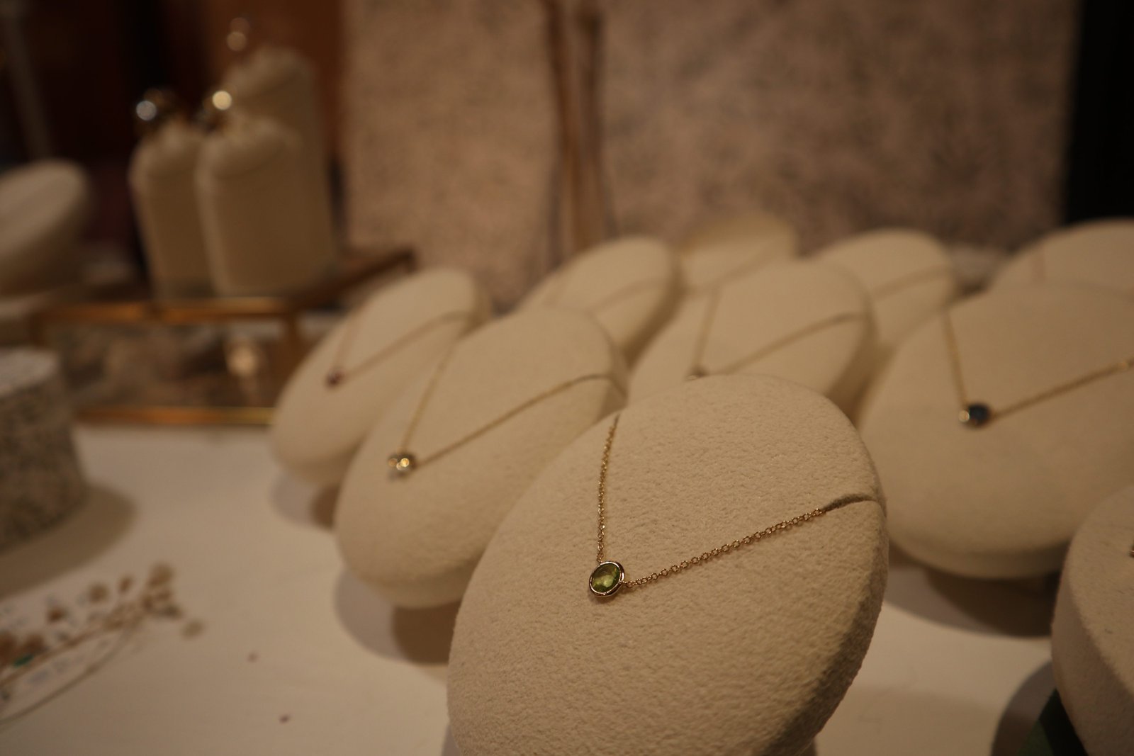 Rosi Ross - MEANINGFUL GEMS OF OOLIVE JEWELRY