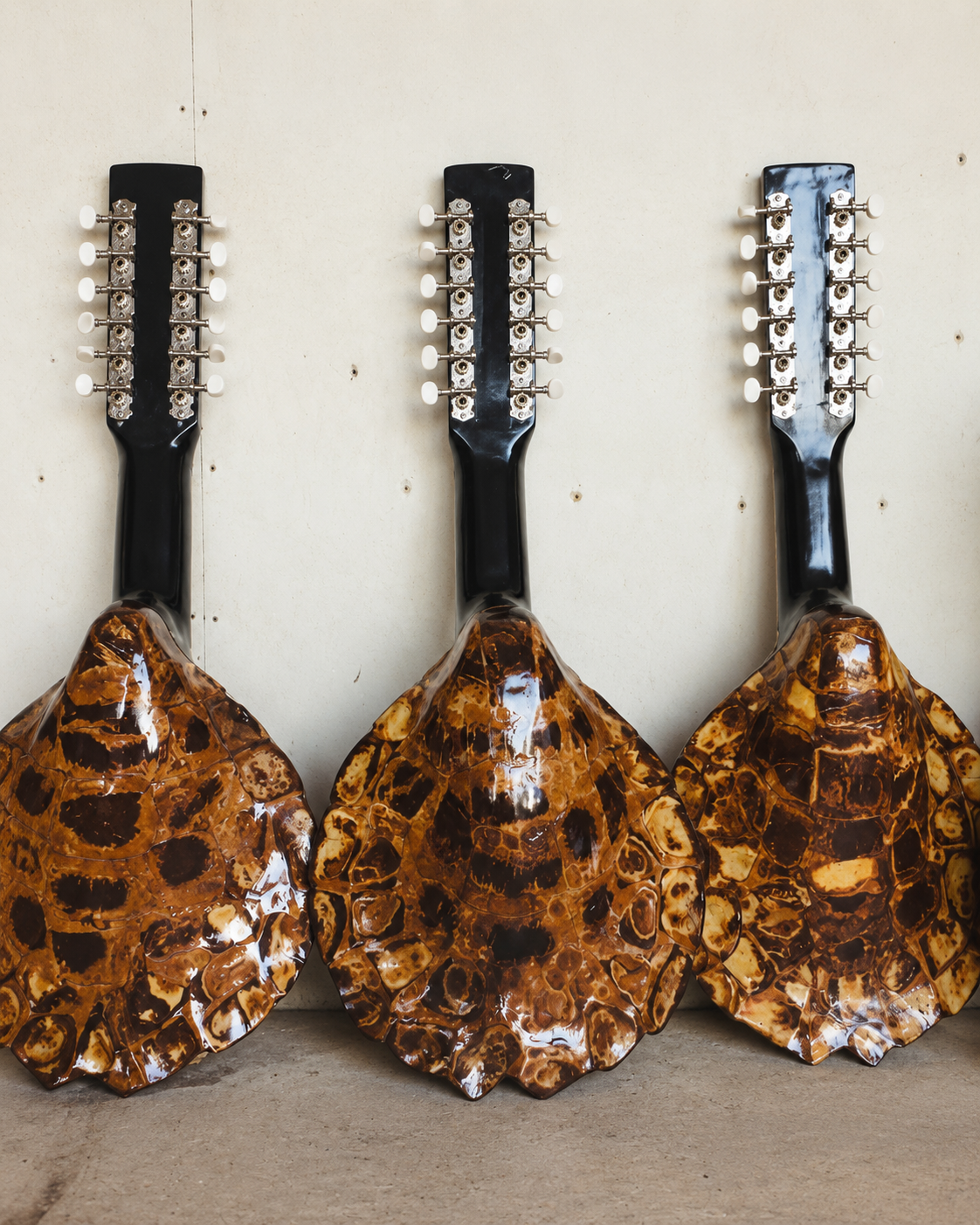 Decorative handcrafted guitars displayed in Cebu, Philippines, reflecting the region&rsquo;s tradition of guitar making and local craftsmanship.