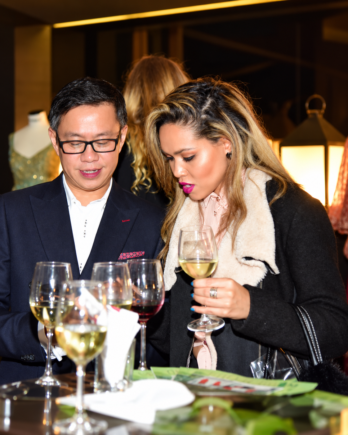 Rosi Ross attending an Indian couture event and enjoying a wine tasting during the fashion gathering.