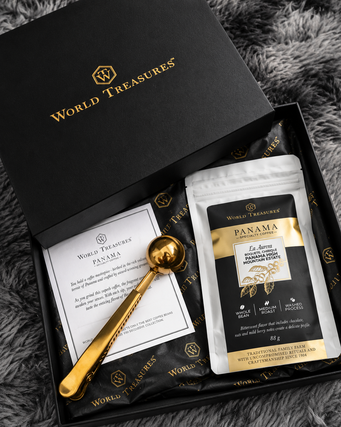 Luxury Panama specialty coffee gift set by World Treasures featuring premium coffee, tasting notes, and gold coffee spoon.