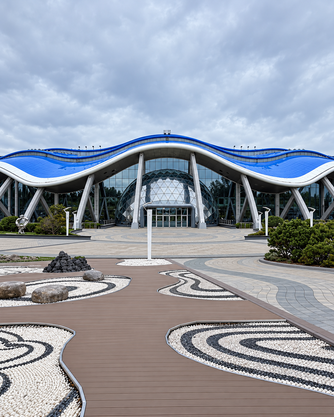 Exterior architecture of Primorskiy Oceanarium in Vladivostok, Russia, featuring its distinctive wave-inspired design.