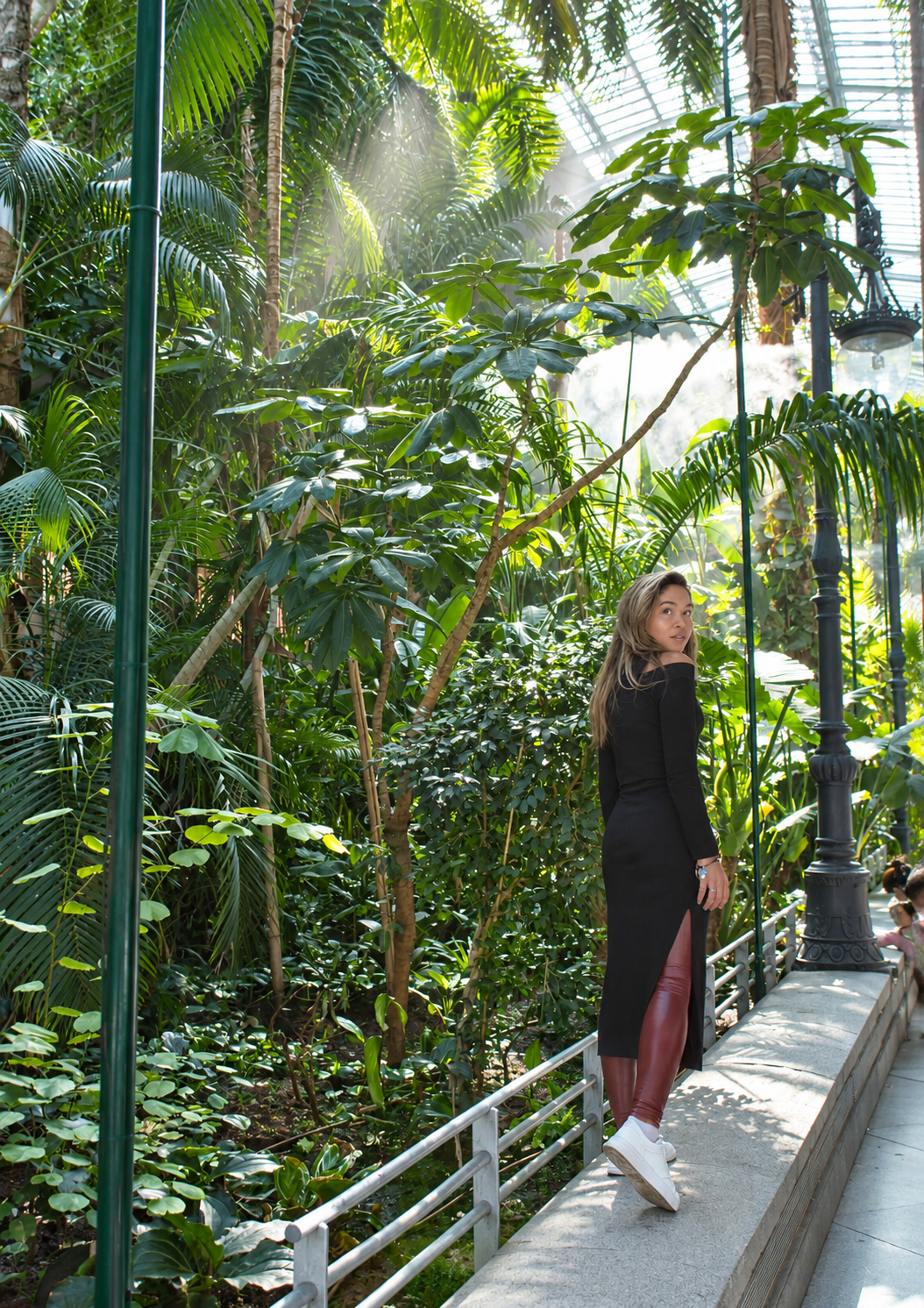 Rosi Ross exploring the tropical garden inside Madrid Atocha railway station in Spain.