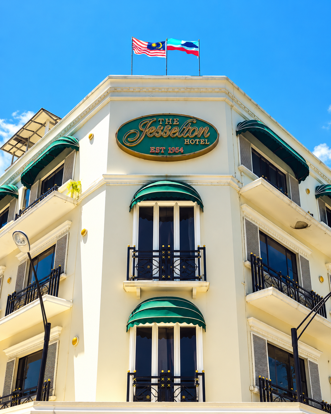 Exterior of The Jesselton Hotel in Kota Kinabalu, Sabah, Malaysia, featuring its distinctive historic architecture.