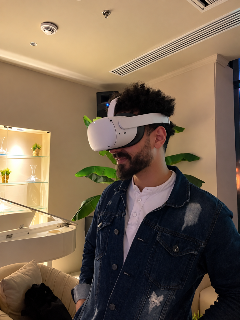 Man using a VR headset during an immersive technology experience exploring virtual worlds and interactive digital environments.