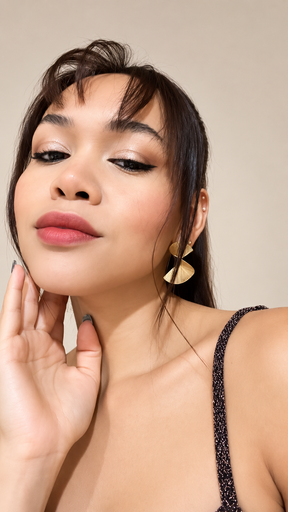 Day-to-night makeup look showcasing luminous skin, soft blush, defined lips, and a polished complexion.