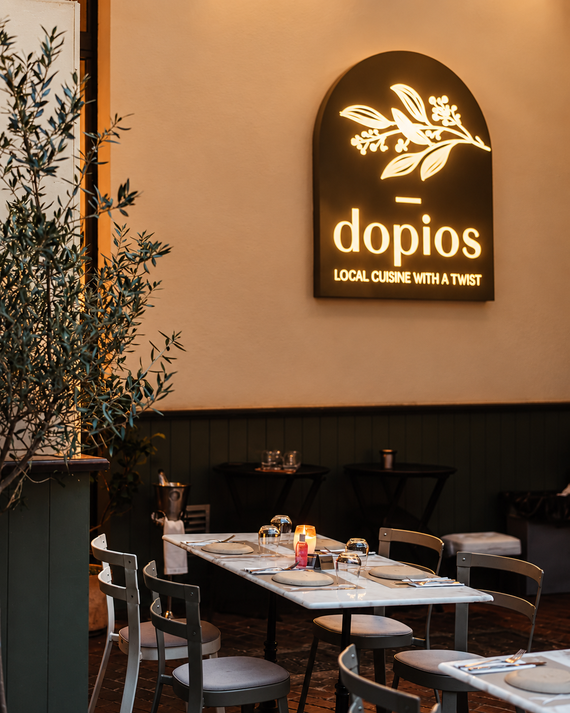Dopios restaurant in Athens featuring warm lighting, modern interiors, and relaxed contemporary Greek dining.
