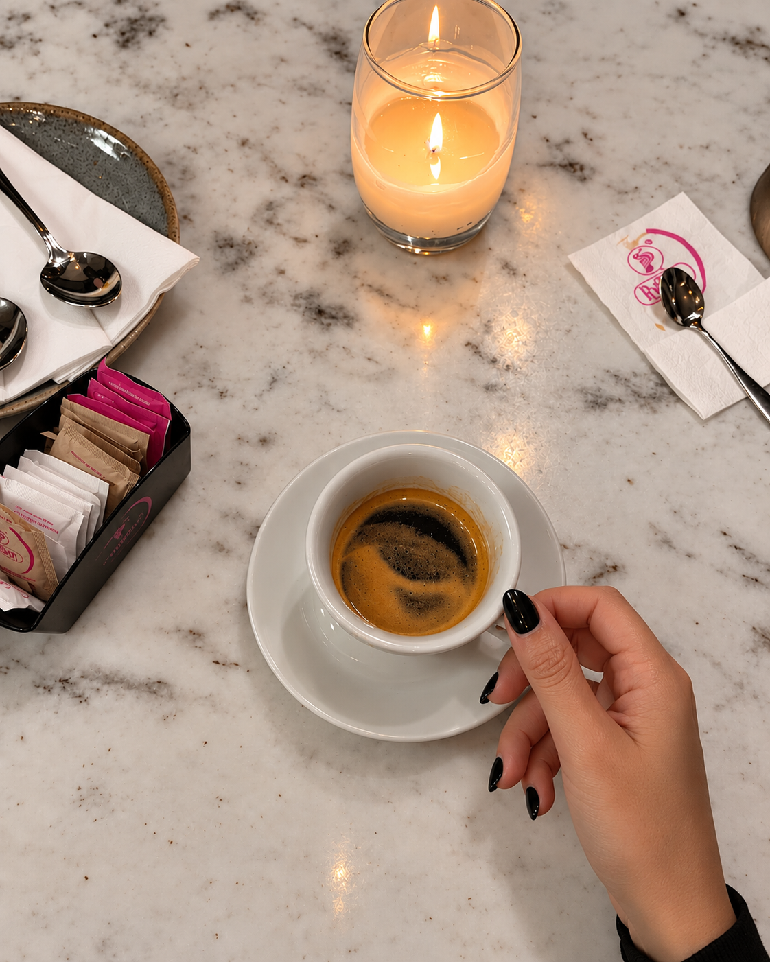Greek coffee served after dinner at Dopios Athens on a marble table.