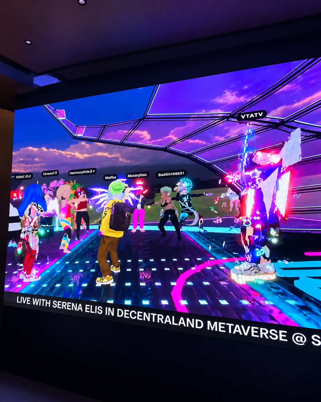 Immersive virtual world experience featuring avatars, digital environments, and a fashion event in the Decentraland metaverse.