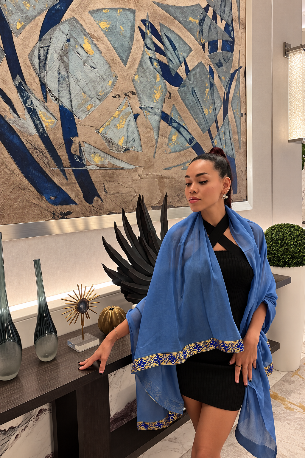 Rosi Ross Styling Tiramisu with Blue Shawl Rosi Ross in black dress with blue shawl, elegantly modeling Tiramisu-themed earrings