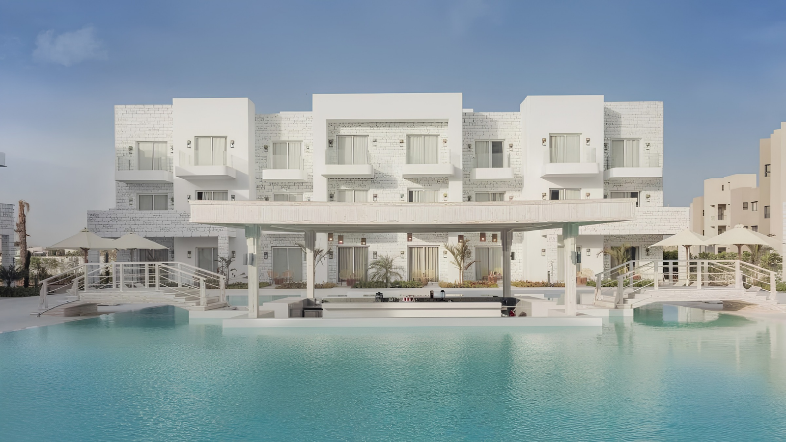 Rosi Ross editorial banner about Ain Sokhna, Tanoak Hotel, Red Sea travel, quiet luxury in Egypt, coastal escape, and views toward the Suez Canal.