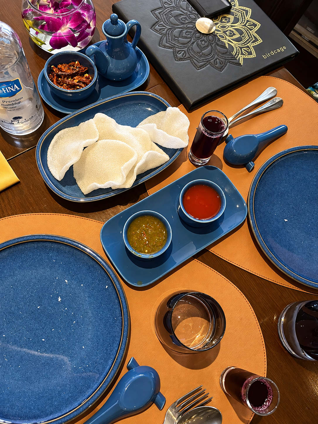 Table setting with blue plates and various condiments at the InterContinental Cairo Semiramis