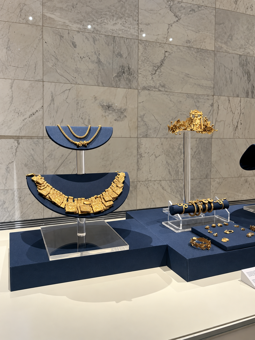 Ancient Gold Jewelry Exhibit at the National Museum of Egyptian Civilization's Exhibit showcasing ancient gold jewelry on display stands at the National Museum of Egyptian Civilization's