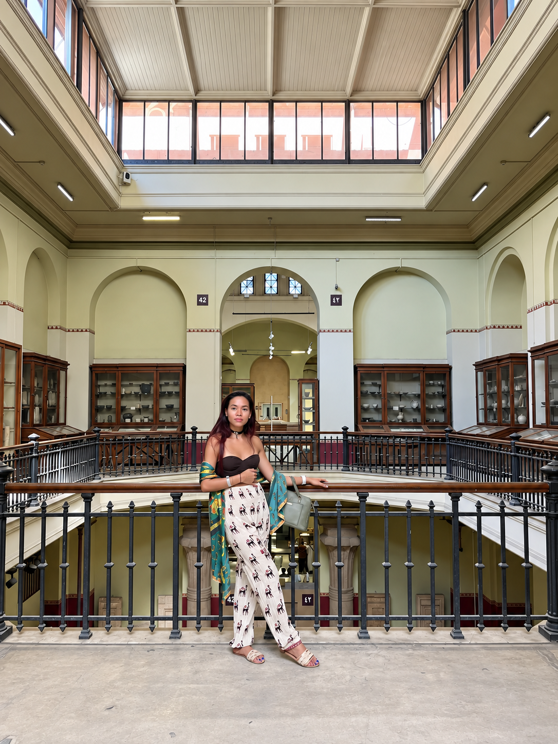 Rosi Ross in Grand Historical Building at the National Museum of Egyptian Civilization in Cairo Rosi Ross standing in a grand historical building with high arched ceilings at the National Museum of Egyptian Civilization in Cairo