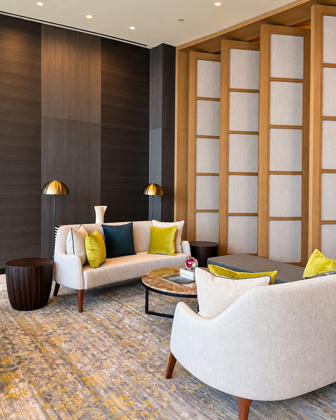 Modern One And Only One Zaabeel lobby with elegant seating, tall wooden panel walls, and stylish lighting.